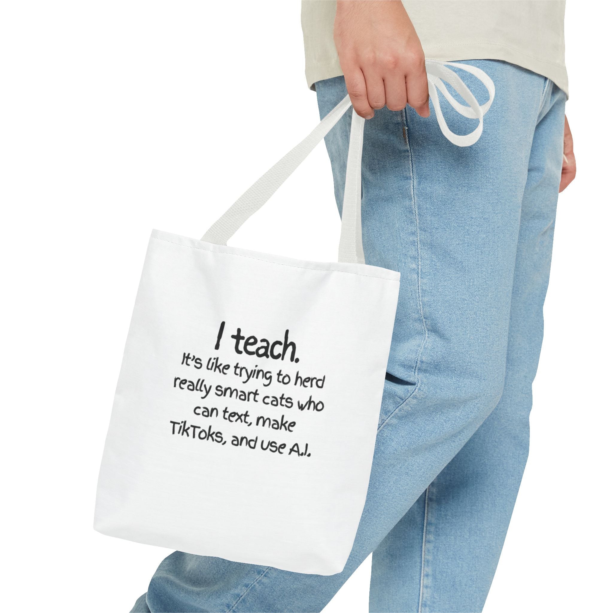Teacher Tote Bag — “I teach. It’s like trying to herd really smart cats who can text, make TikToks, and use AI.”