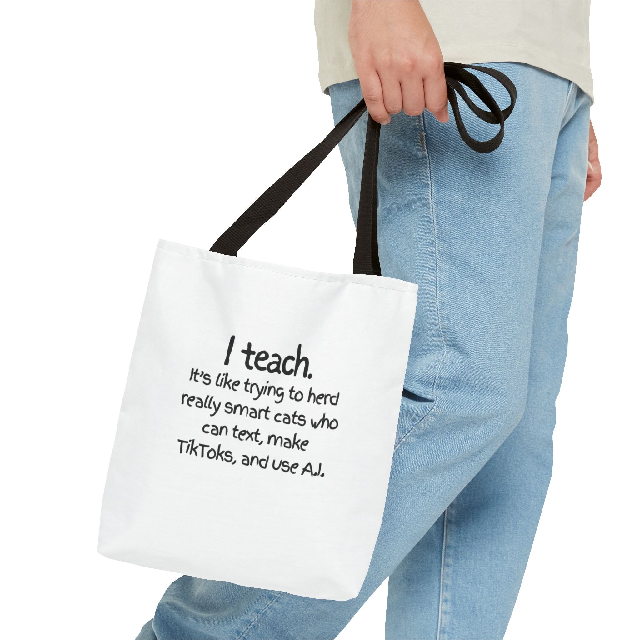 Teacher Tote Bag — “I teach. It’s like trying to herd really smart cats who can text, make TikToks, and use AI.”