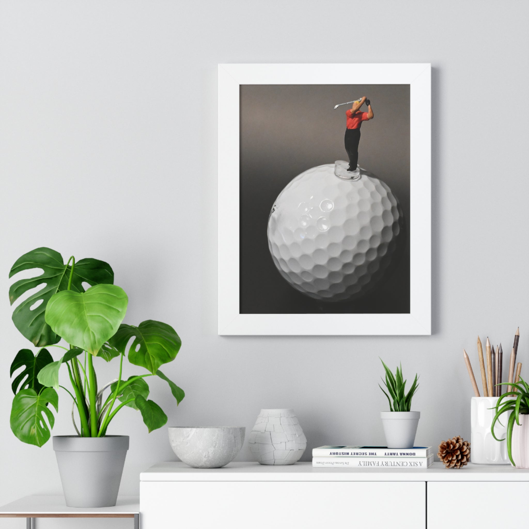 Golf Swing Framed Poster — Miniature Golfer on Giant Golf Ball (Vertical)