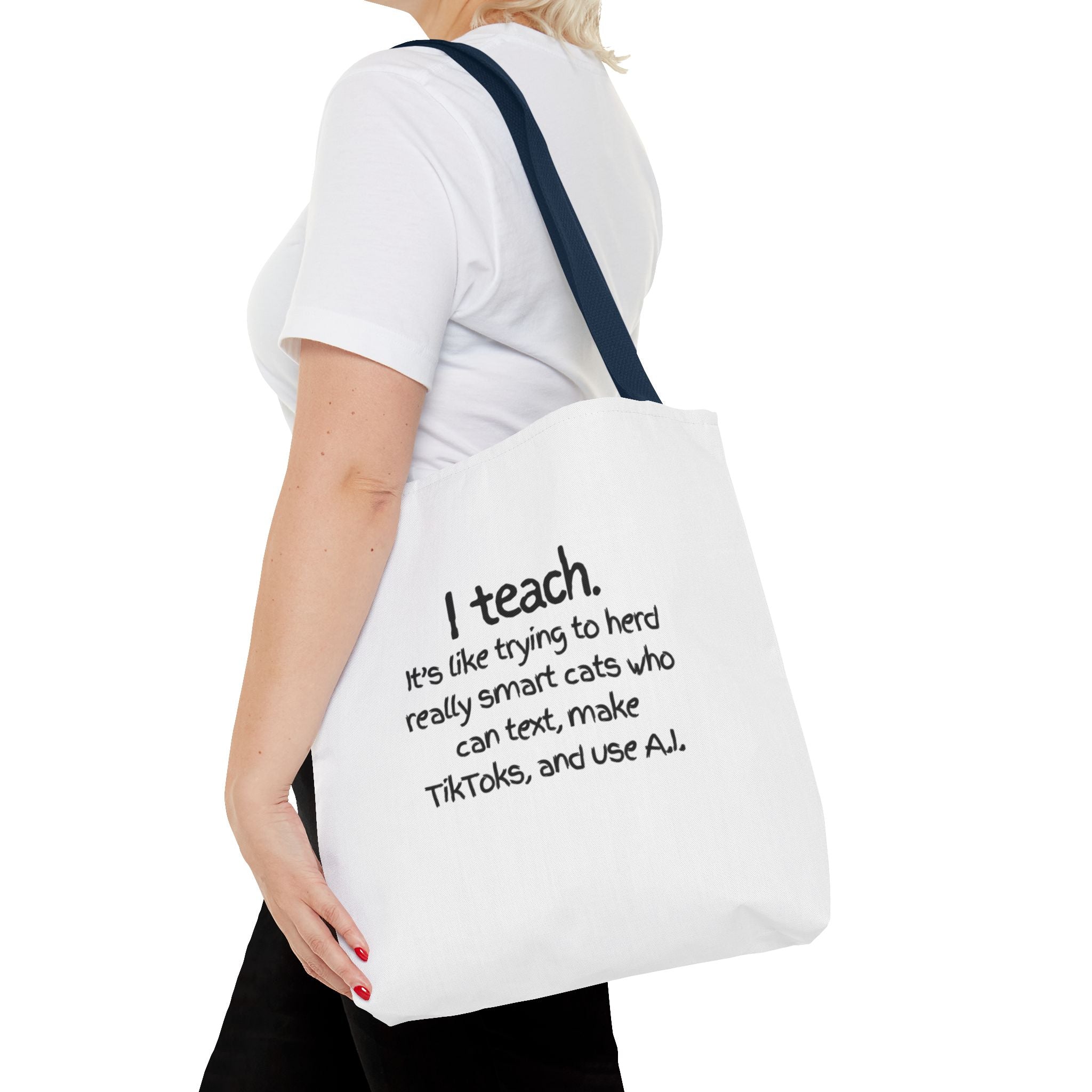 Teacher Tote Bag — “I teach. It’s like trying to herd really smart cats who can text, make TikToks, and use AI.”