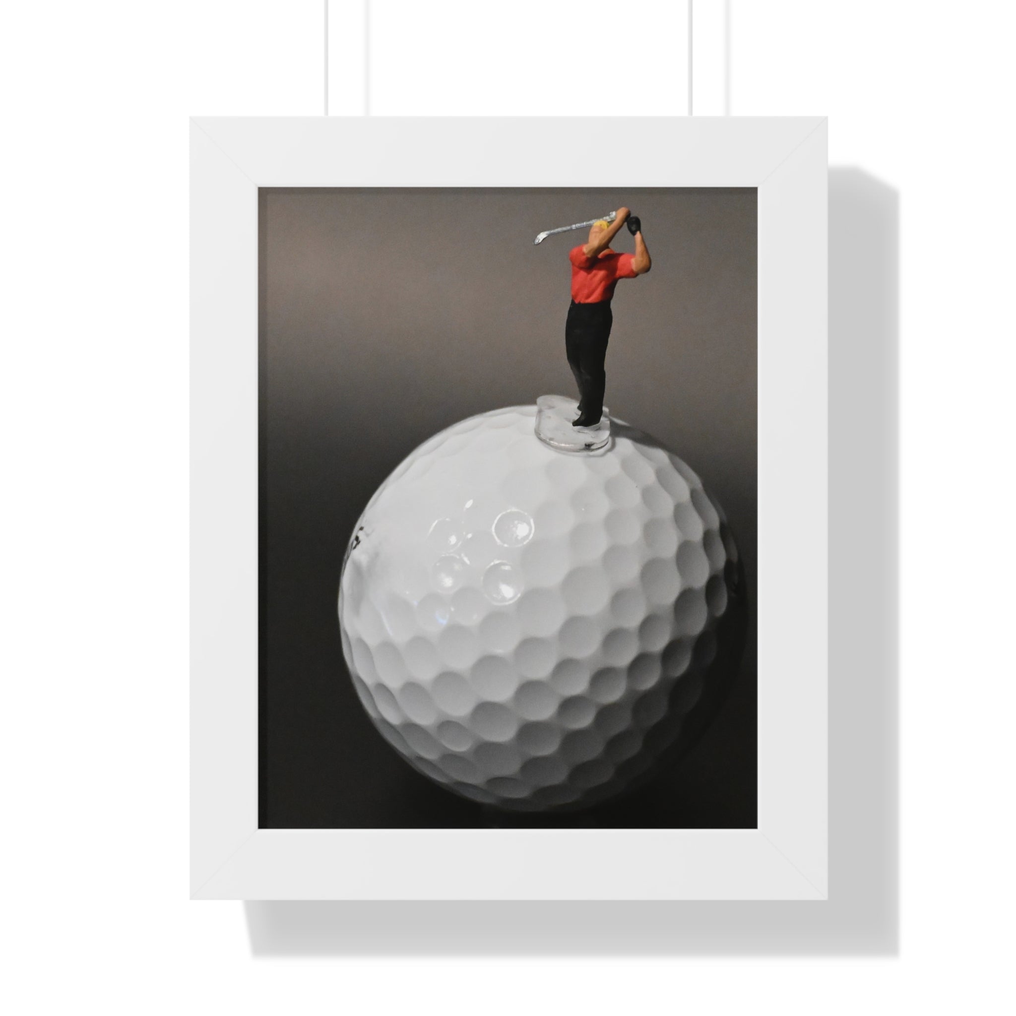 Golf Swing Framed Poster — Miniature Golfer on Giant Golf Ball (Vertical)