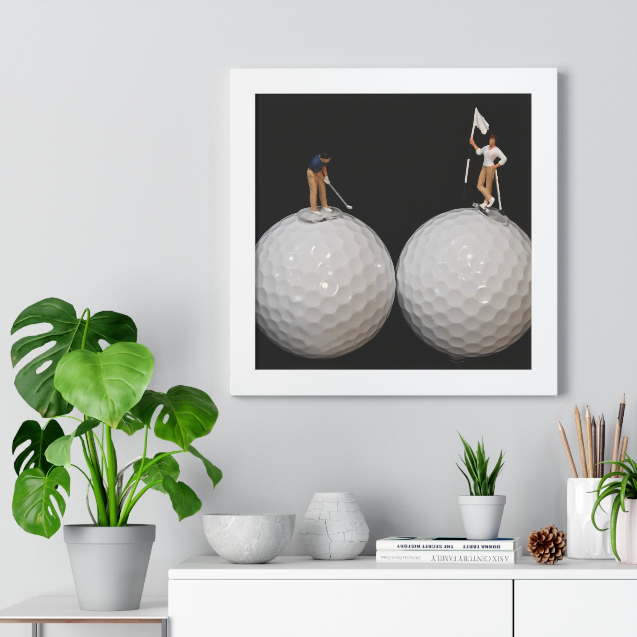Framed Poster — Miniature Golfers on Golf Ball Landscape (Vertical)