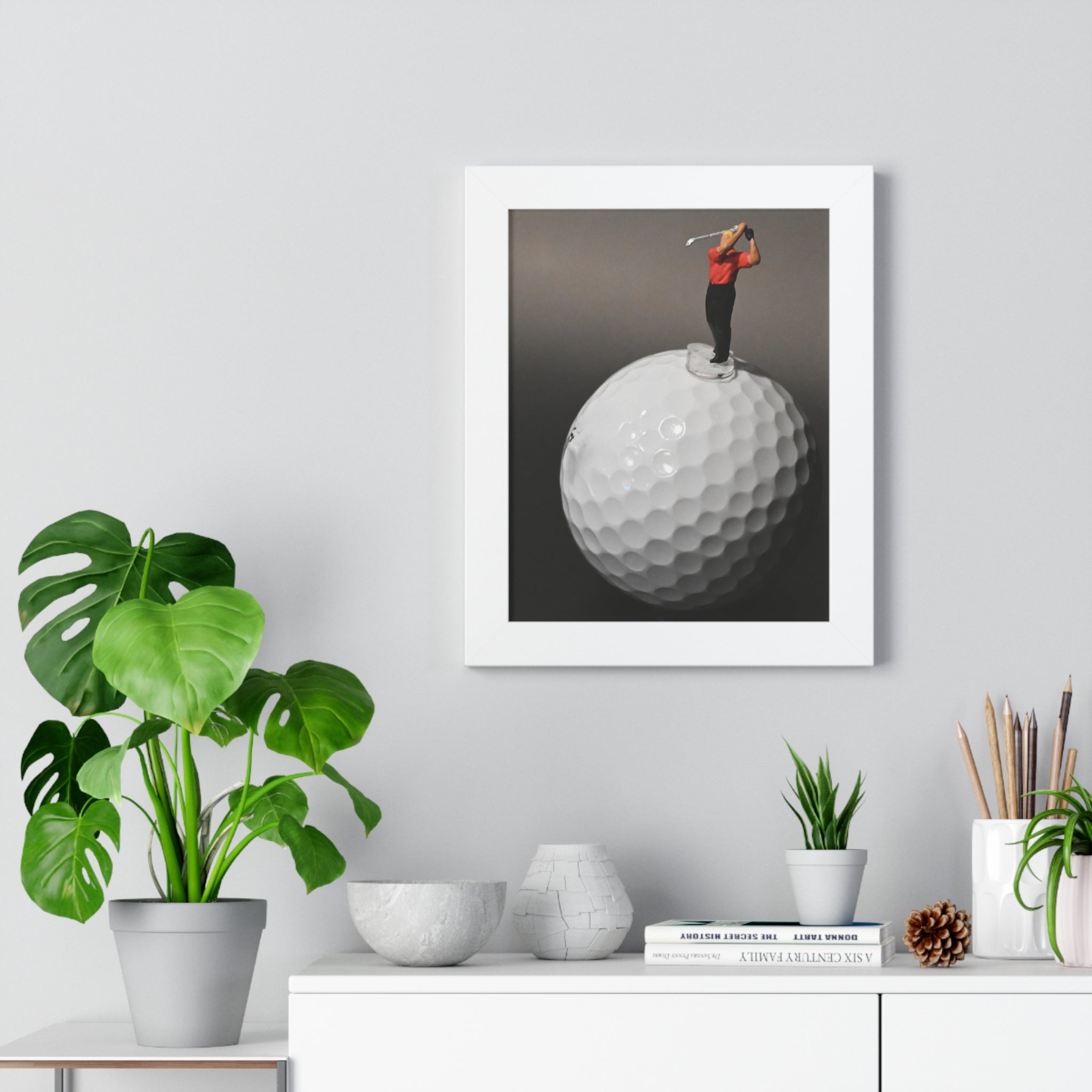 Golf Swing Framed Poster — Miniature Golfer on Giant Golf Ball (Vertical)